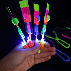 LED slingshot copter toy glowing with blue light for night outdoor play and games