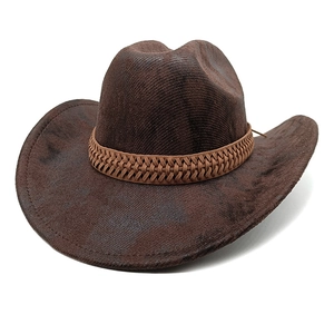 Detailed side view of vintage brown cowboy hat with leather braided band accent