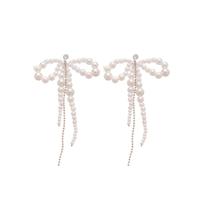 Elegant bow-shaped pearl tassel earrings with silver needles and crystal accents