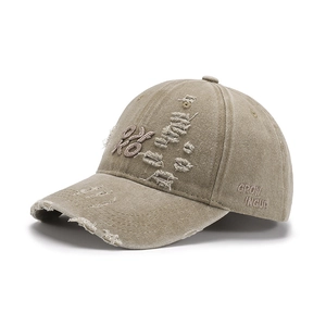 Vintage khaki baseball cap with 3D letter embroidery and distressed details