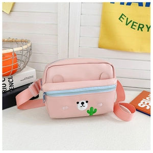 Close-up of pink PU leather kids crossbody bag featuring cute white bear and cactus detail