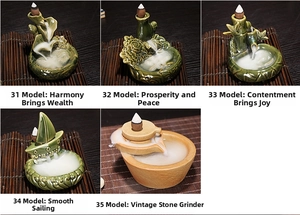 Detail view of five ceramic backflow incense burners with lotus and bamboo motifs