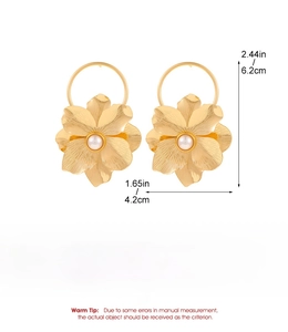 Detailed view of gold flower earrings with pearls, alloy texture, and size measurements