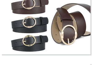 Detailed view of PU leather belts with round golden butterfly buckles in black and brown