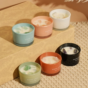 Set of macaron scented candles with natural crystal stones in six pastel colors