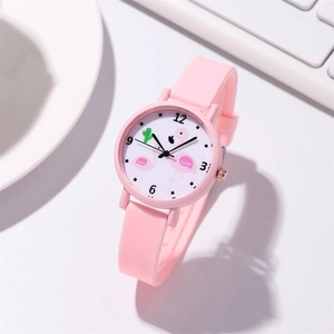 Detail of pink silicone watch band with cartoon flamingo pattern and digital dial display