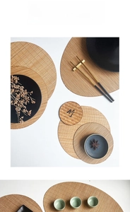 Detailed close-up of woven bamboo coasters and place mats with Zen aesthetic style
