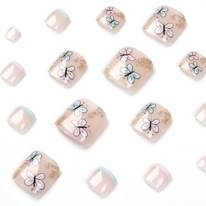 Faux ongles de pieds papillon bleu et violet avec feuille d'or et base nude