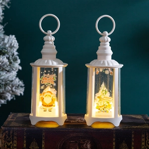 Detail of white vintage LED Christmas lanterns with Santa Claus and festive warm lights