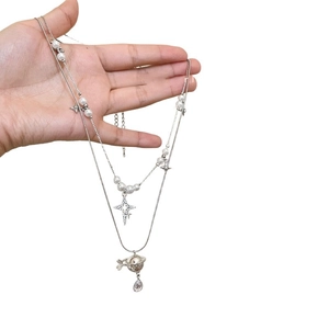 Double-layer pearl necklace with sparkling Saturn planet and crystal water drop pendant