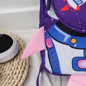 Close-up of purple astronaut backpack with pink fin detail and durable nylon fabric