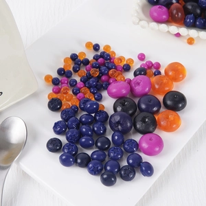 Mischung aus künstlichen PVC-Blaubeeren in Blau und Lila für DIY-Deko und Bastelarbeiten