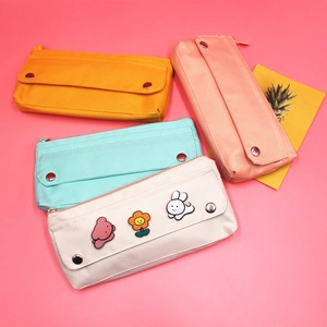 Minimalist oxford fabric pencil cases in four colors with cute cartoon patches