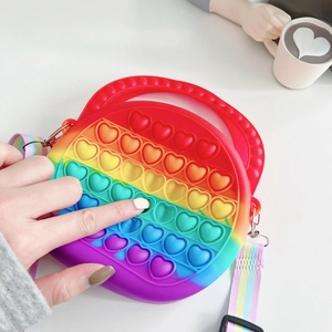 Rainbow silicone heart pop it sensory shoulder bag detail, vibrant multicolour fidget purse.