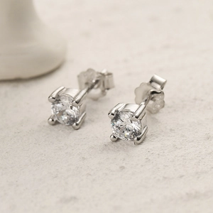 Classic S925 sterling silver four-prong stud earrings with clear round cubic zirconia