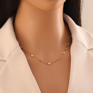 Exquisite gold stainless steel necklace with heart pendants and crystal accents