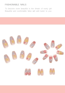 Coffin shape pink press-on nails with colorful hand-painted hearts and tiny rhinestones