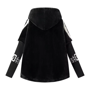 Back view of a black fuzzy hooded jacket featuring white S#C lettering on the sleeves