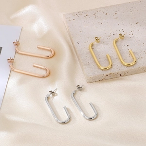 Boucles d'oreilles géométriques en U en or, argent et rose sur soie et pierre