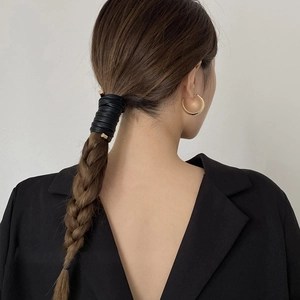 Chic black faux leather ponytail wrap with elegant gold metal tips for women
