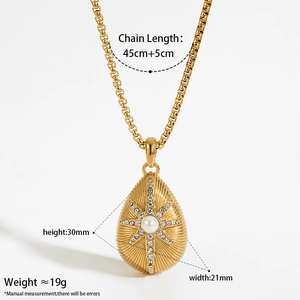 French vintage gold necklace with pearl and starburst zircon stones in teardrop shape