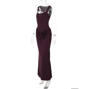 Detailed view of the dark purple floor-length evening dress with waist ruching and slim fit