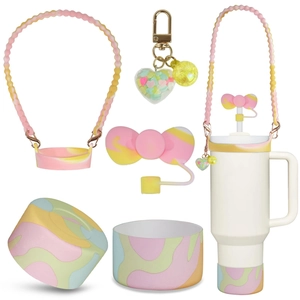 Pink and yellow gradient silicone sleeve and heart keychain for Stanley tumbler