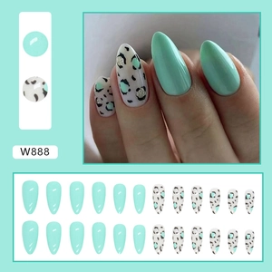Detailed view of mint green and leopard print almond press-on nails set style W888