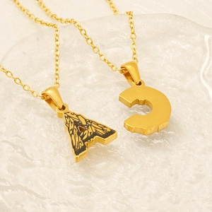 Gold plated stainless steel necklace with textured bark pattern initial pendants A and C