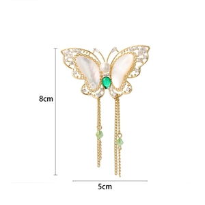 Elegant butterfly brooch with shell wings, white pearl and green zircon tassel tassels