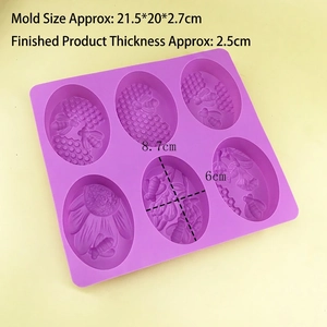 Purple silicone mold for handmade soap featuring 6 oval bee and flower relief patterns