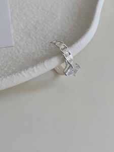 Detail of 925 sterling silver ring with Cuban chain band and square zircon stone