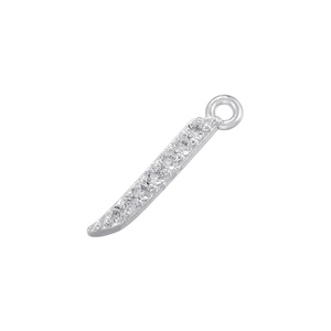 Macro detail of silver curved pendant with cubic zirconia and attachment loop