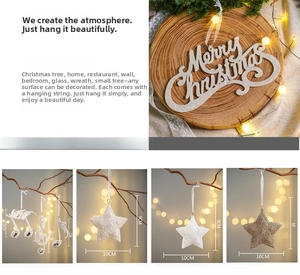 Detailed view of Merry Christmas glitter ornaments with hanging string for holiday decor