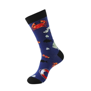 Close-up of navy cotton mid-tube socks with sea life patterns like crabs and fish