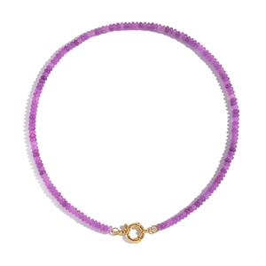 Detail of vintage beaded necklace with purple natural stones and gold spring clasp