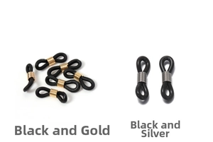 Detail of black silicone eyewear chain loops with gold and rhodium metal springs