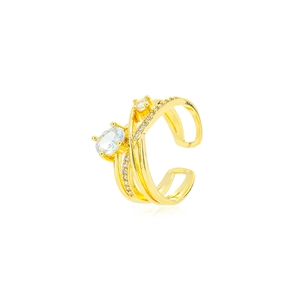 Crossed multi-layer gold ring with a large oval zircon and pavé setting on white background
