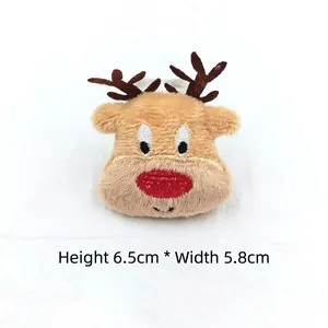 Detail of plush reindeer accessory with red nose, embroidery, and 6.5cm height dimension