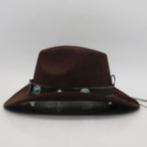 Detail of dark brown wool felt cowboy hat featuring turquoise beaded ethnic band decor