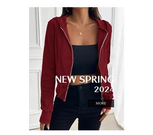 Detail of slim-fit burgundy zip-up hoodie featuring a vertical ribbed knit texture