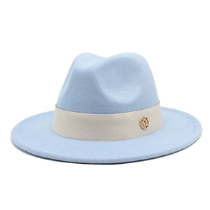 Classic light blue wool fedora hat with beige ribbon and golden metal logo badge