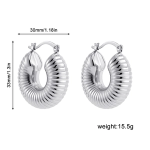 Detailed view of silver ribbed C-shape earrings with size metrics 33mm and weight info