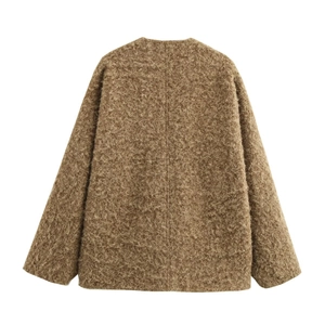 Detail view of the brown fuzzy fleece texture and thick fabric on back of the jacket