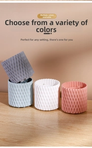 Detailed view of four colorful makeup brush holders with textured wave pattern on wood