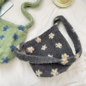 Close-up of floral plush tote bags showing soft lamb wool texture and flower patterns