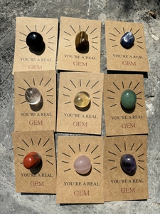 Set of nine polished natural gemstones on brown kraft cards with You Are A Real Gem text