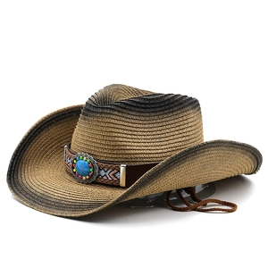 Detail of woven straw cowboy hat with bohemian turquoise stone buckle and wind cord
