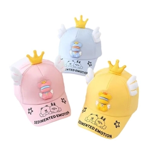 Cute kids cartoon baseball caps with crown and ears in pink blue and yellow colors