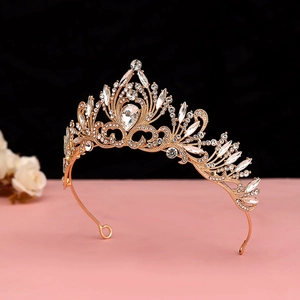 Macro shot of gold wedding crown with sparkling marquise and round cut rhinestones